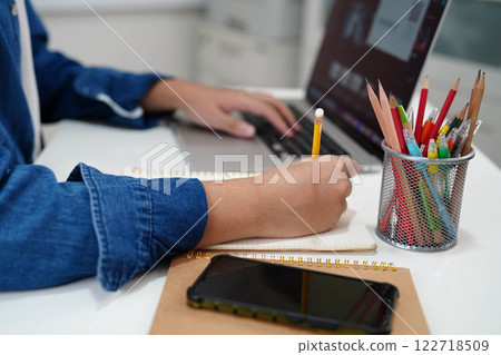 Teenage using tablet for communication, search data internet website to learn. Teenage using tablet for communication, search data internet website to learn. 122718509