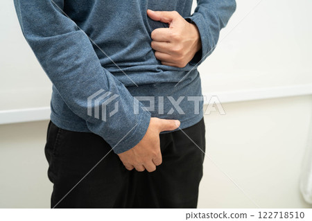 Hernia, Asian man stomach ache, abdominal pain and urology problem health. 122718510