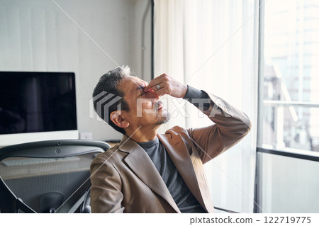 Man with tired eyes Man with tired eyes 122719775