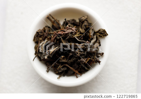 Japanese or Chinese tea leaf on white background. 122719865