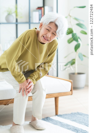 A senior woman with a knee sore A senior woman with a knee sore 122722484