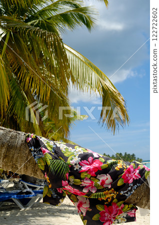 Clothing drying on palm Clothing drying on palm 122722602