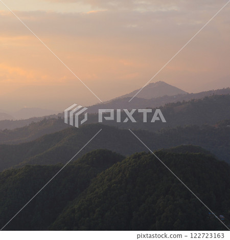 Colorful evening sky over hills near Pokhara, Nepal. Colorful evening sky over hills near Pokhara, Nepal. 122723163