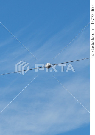 Electric wires seen around town 122723652