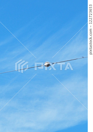 Electric wires seen around town 122723653