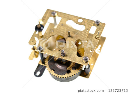 Old alarm clock mechanism isolated on white 122723713