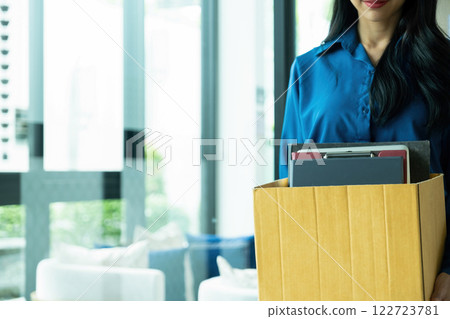 A woman moving out of work. 122723781