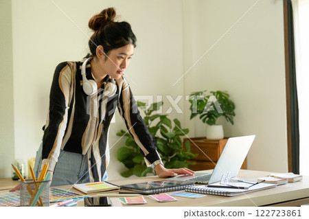 Young designer working on color palette. 122723861