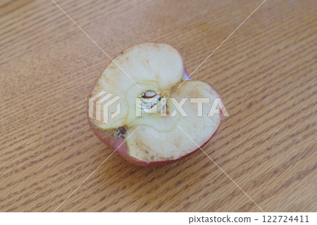 Damaged apple 122724411