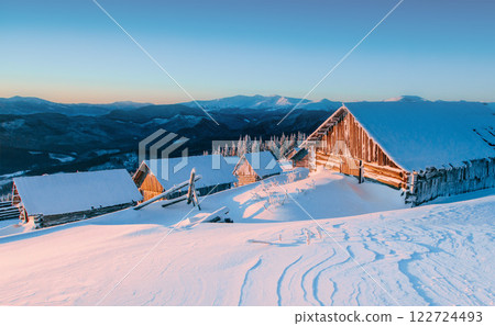 Mysterious winter landscape majestic mountains in winter. Magical winter snow covered tree. Winter road in the mountains. In anticipation of the holiday. Dramatic wintry scene. 122724493