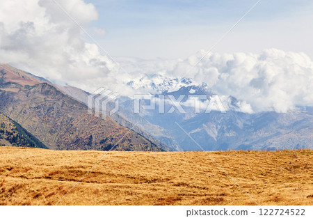 Thick fog on the mountain pass Goulet. Autumn Landscape. Georgia, Svaneti. Caucasus mountains 122724522
