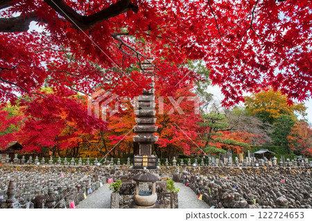 pagoda at graveyard by red maple leaf, Adashino temple, Arashiyama 122724653