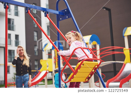 mother with child on the playground 122725549