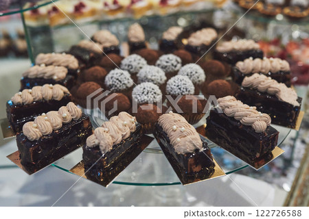 delicious colorful cookies and cakes on the wedding candy bar. delicious colorful cookies and cakes on the wedding candy bar. 122726588
