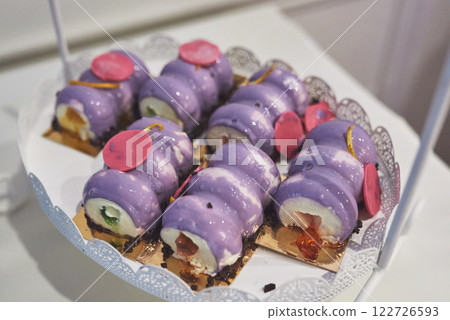 delicious colorful cookies and cakes on the wedding candy bar. delicious colorful cookies and cakes on the wedding candy bar. 122726593