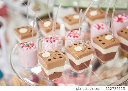 Delicious sweets on candy buffet Delicious sweets on candy buffet 122726615