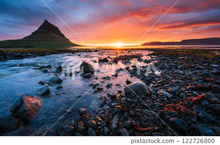The picturesque sunset over landscapes and waterfalls. Kirkjufell mountain,Iceland 122726800
