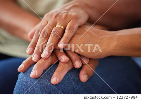 Support, cancer and trust by couple hands holding in love and comfort together in the hope of unity. Closeup of united people touching and showing compassion and care for a happy marriage 122727984