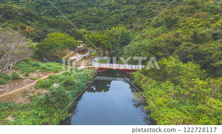 Feb 1 2025 Scenic Bridge Over a Calm River Amidst Lush Green Forest Feb 1 2025 Scenic Bridge Over a Calm River Amidst Lush Green Forest 122728117