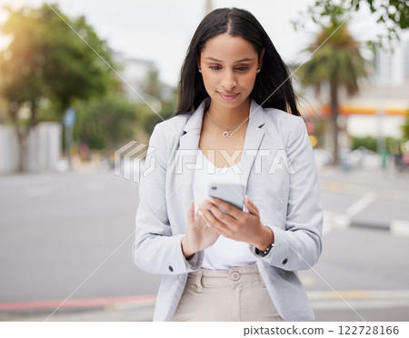 Business woman in communication on phone in city, working on 5g smartphone and walking in the street with cellphone. Happy corporate worker planning schedule on email, in conversation on internet 122728166