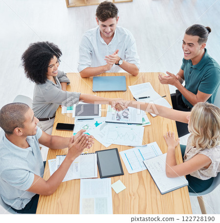 Teamwork, handshake and applause with a team in collaboration and celebration of success in a meeting. Trust, support and wow in the planning of strategy, vision and mission for future growth Teamwork, handshake and applause with a team in collaboration and celebration of success in a meeting. Trust, support and wow in the planning of strategy, vision and mission for future growth 122728190