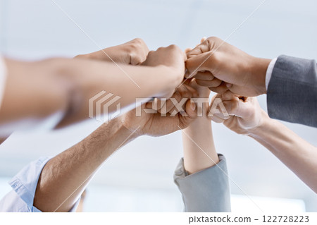Diversity, hand or fist of business people celebrate, unite and support each other. Collaboration of corporate professional team or company worker touching showing success inside a startup office Diversity, hand or fist of business people celebrate, unite and support each other. Collaboration of corporate professional team or company worker touching showing success inside a startup office 122728223