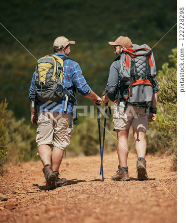 Fitness, nature hiking and exercise of friends on mountain workout in forest park on summer day.Walk adventure, active and fit sport men trekking in green grass trees hike or foot path track Fitness, nature hiking and exercise of friends on mountain workout in forest park on summer day.Walk adventure, active and fit sport men trekking in green grass trees hike or foot path track 122728298