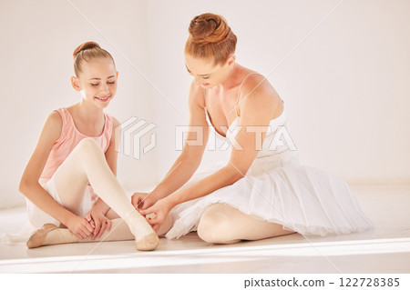 Ballet coach, dance and student training of a young ballerina and dancing teacher help. Exercise and dancer workout of a girl and tutor helping with her shoes for a creative stage show performance 122728385