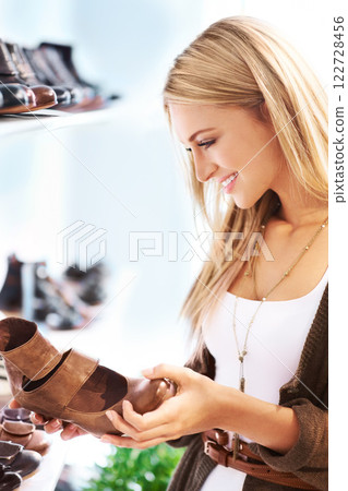Shoes sale, retail discount and shopping of a happy woman customer looking at shop stock. Fashion boutique and clothing store with a young woman smile, happy and excited to buy, shop and purchase Shoes sale, retail discount and shopping of a happy woman customer looking at shop stock. Fashion boutique and clothing store with a young woman smile, happy and excited to buy, shop and purchase 122728456