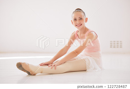 Wellness, fitness and ballet girl learning, workout and training in studio, dancer stretching before theatre event or sport exercise. Health, education and sports student warmup for art gym concert 122728487
