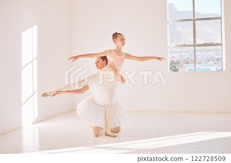 Fitness, support and ballet teacher training ballerina, helping with posture and balance in a dance studio. Flexible girl practice routine for elegant and classic performance, bonding in rehearsal 122728509