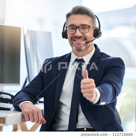 Thumbs up, yes and success deal for a call center agent with contact us and happy about telemarketing. Portrait of a CRM manager or customer service employee smiling due to good business 122728660