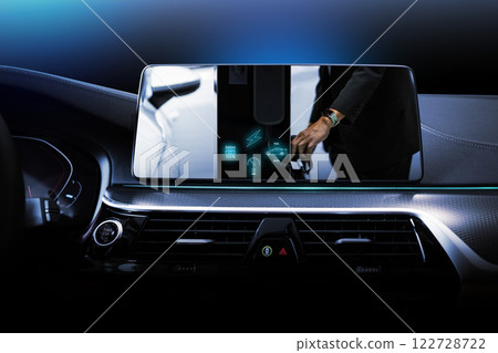 Electric car display screen that is showing the display of electric charging. 122728722