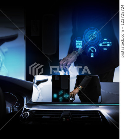 Electric car display screen that is showing the display of electric charging. 122728724