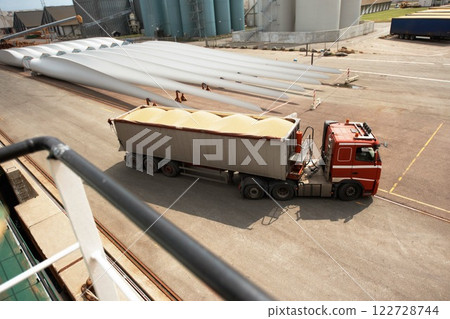 Delivery, cargo and shipping truck in an industrial, manufacturing and distribution job site. Export transport lorry of ecommerce, factory and industry supply chain product stock at a freight depot Delivery, cargo and shipping truck in an industrial, manufacturing and distribution job site. Export transport lorry of ecommerce, factory and industry supply chain product stock at a freight depot 122728744