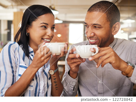 Romance, fun and coffee date with happy couple at a cafe or restaurant, bonding, in love and talking. Young boyfriend and girlfriend enjoying their relationship and free time on the weekend together 122728842