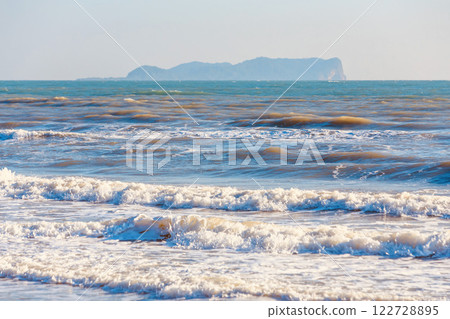 Strong waves in the sea during the winter morning in Thailand. Select a specific focus point. 122728895