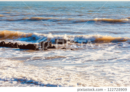 Strong waves in the sea during the winter morning in Thailand. Select a specific focus point. 122728909