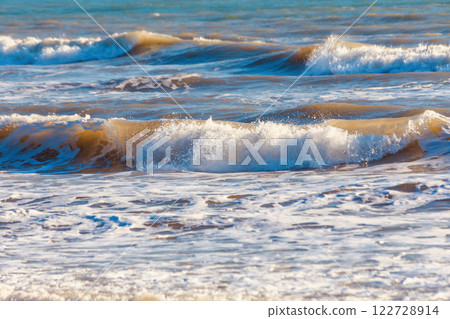 Strong waves in the sea during the winter morning in Thailand. Select a specific focus point. Strong waves in the sea during the winter morning in Thailand. Select a specific focus point. 122728914