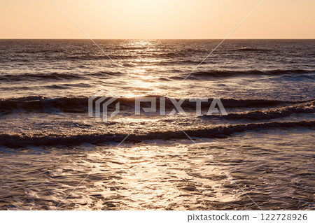 Sunlightr and strong waves in the sea during the winter morning in Thailand. Select a specific focus point. 122728926
