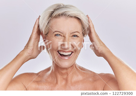 Mature, portrait and woman touching hair against studio background with happy face copy space. Wellness woman for skincare, beauty cosmetics or healthy body supplements for anti ageing. 122729300