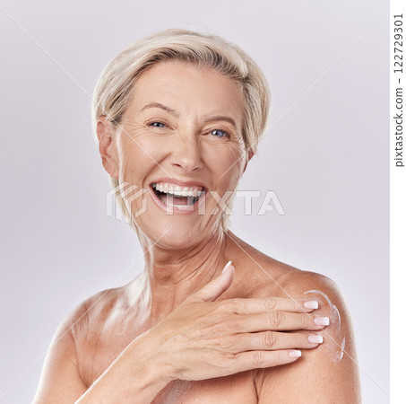 Sunscreen, skincare and body care of senior woman applying cream to skin with a studio portrait. Skin care, clean and hygiene model with anti aging wrinkles or moisturizing product for aging wellness 122729301