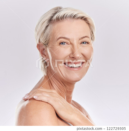 Mockup, beauty and skin care with face happy mature woman smiling and enjoying hygiene treatment. Portrait of smiling senior confident and proud of her natural skin, satisfied with a pamper session 122729305