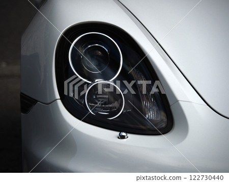 White sports car headlights White sports car headlights 122730440