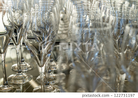 Clear glasses lined up Clear glasses lined up 122731197