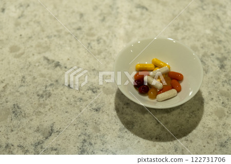 White plate with colorful supplements and health care White plate with colorful supplements and health care 122731706