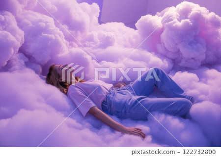 Young woman lying on clouds having a rest in dreamlike atmosphere Young woman lying on clouds having a rest in dreamlike atmosphere 122732800