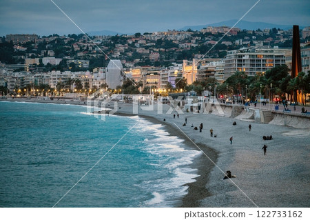 Nice city promenade in the evening at blue hour, buildings with mountains 122733162