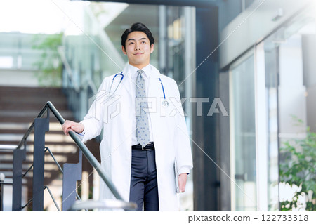 A doctor in a white robe A doctor in a white robe 122733318