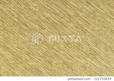 Closeup, macro of yellow fabric texture background. Satin diagonal weaving cloth structure, canvas 122733634